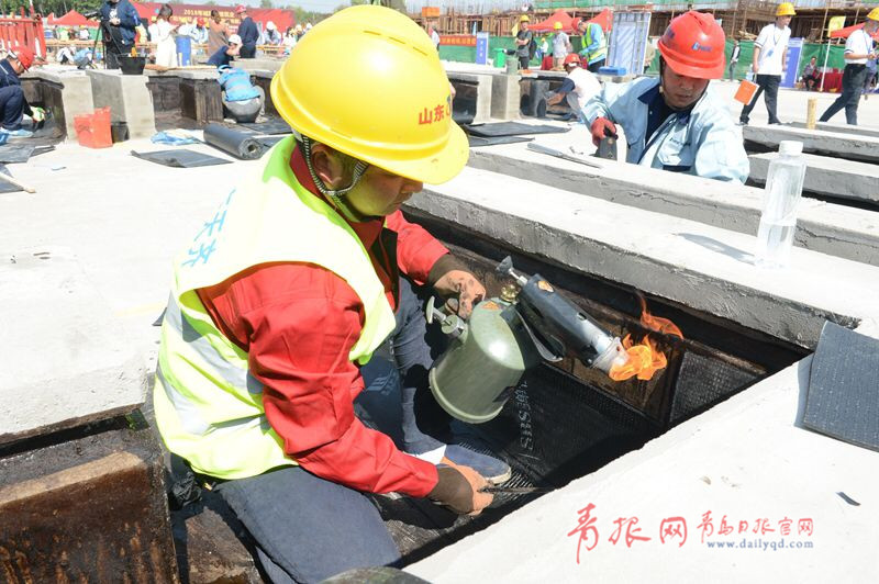 比速度拼質(zhì)量！青島農(nóng)民工建筑技能大比拼(圖2)